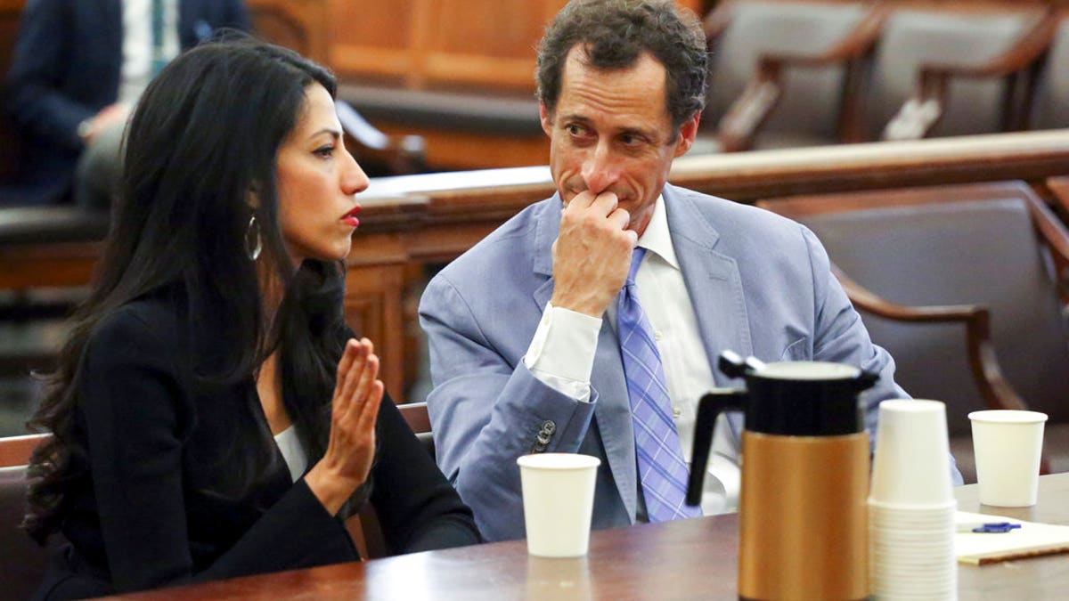 Anthony Weiner, Right and Huma Abedin, appear the court in New York on Wednesday, September 13, 2017. The couple asked a New York City Judge Privacy in their case of divorce. (Jefferson Siegel/The Daily News Via AP, Pool)
